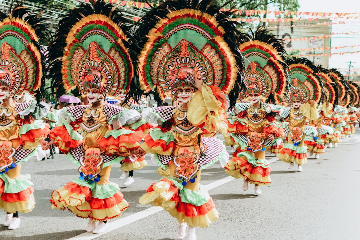 a group of people that are standing in the street