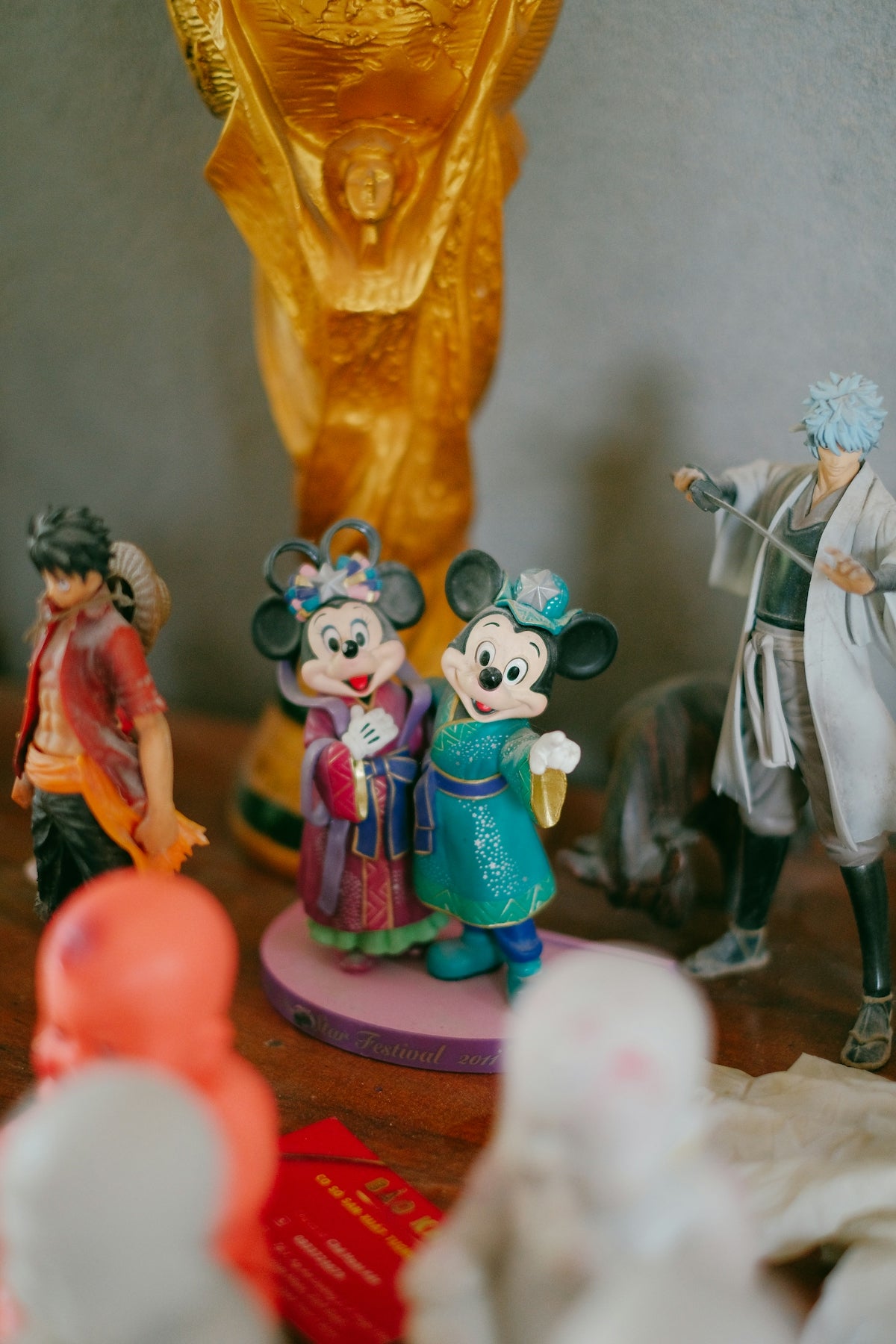 a couple of figurines that are on a table