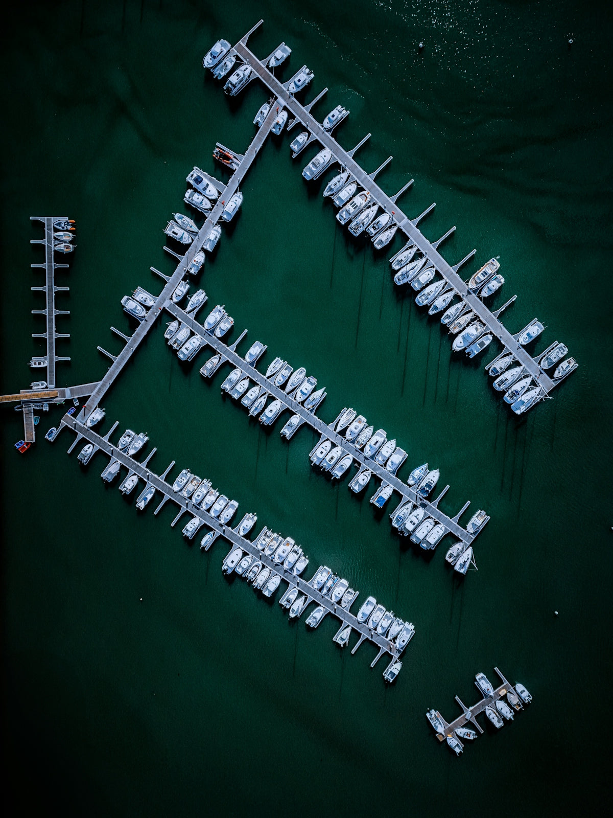 Boats are docked at a marina.