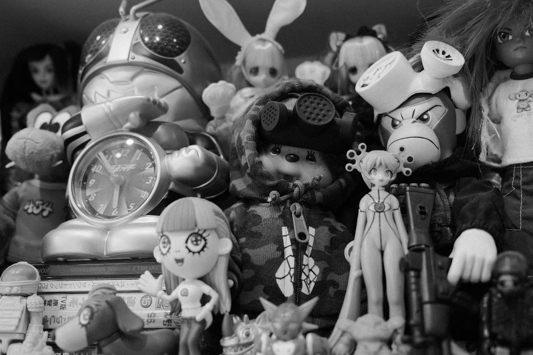 A collection of toys and figurines fills the shelf.