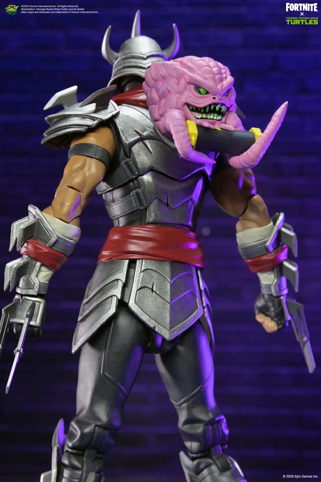 Teenage Mutant Ninja Turtles Fortnite Shredder Actionfigur i 18 cm skala med utbytbara händer, magnetisk Krang-ryggsäck och exklusivt Fortnite-kod
