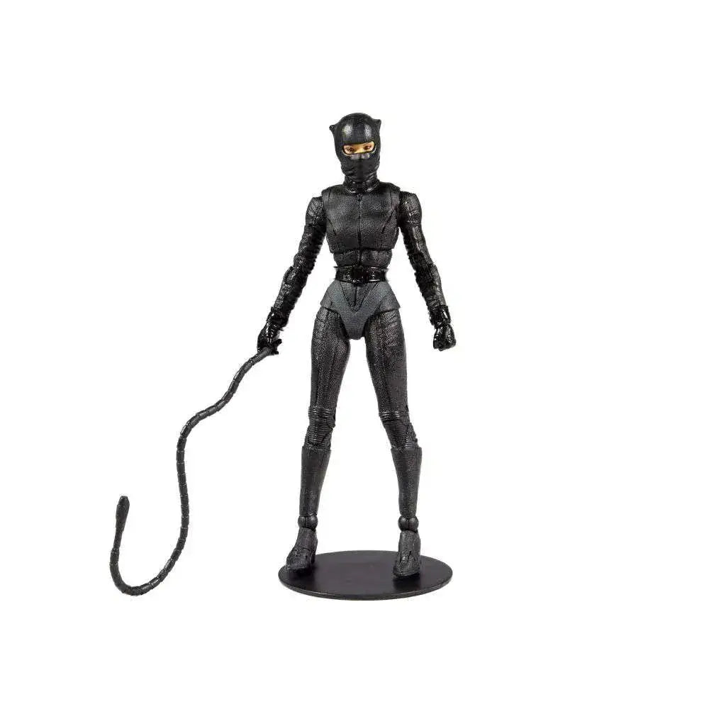 Svart Catwoman actionfigur med texturerad dräkt och svans på rund bas