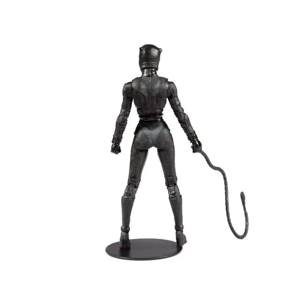 Svart Catwoman actionfigur med texturerad dräkt och svans på rund bas