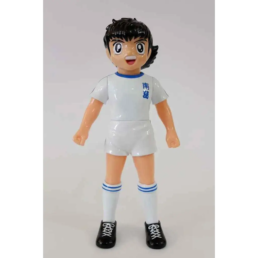 Glossig vit plastfigur av Captain Tsubasa Mjuka, tecknad fotbollsspelare med svart hår