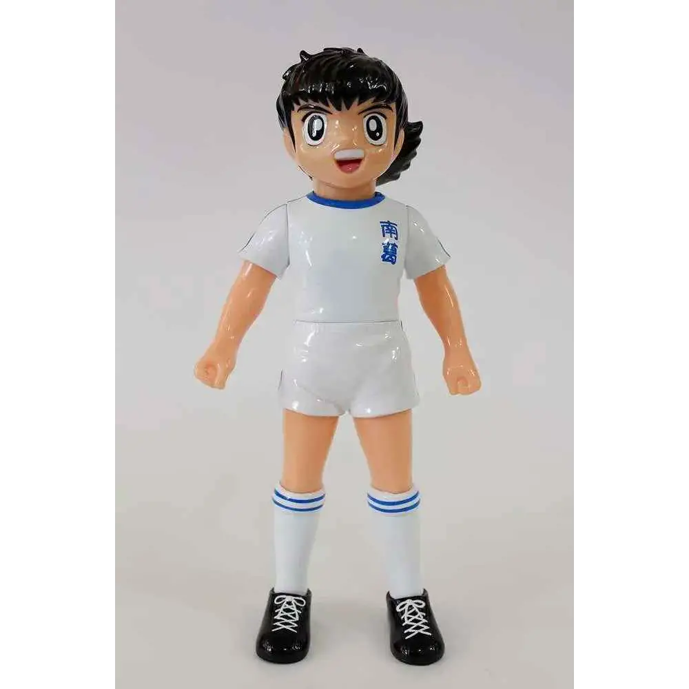 Vit Captain Tsubasa Mjuka vinylfigur: vit plastfigur med svart hår, blå kanter