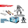 Gråmålad varulvsminiatyrmodell på cirkulär bas med målarfärg och penslar för D&D Nolzur Ice Troll-kit