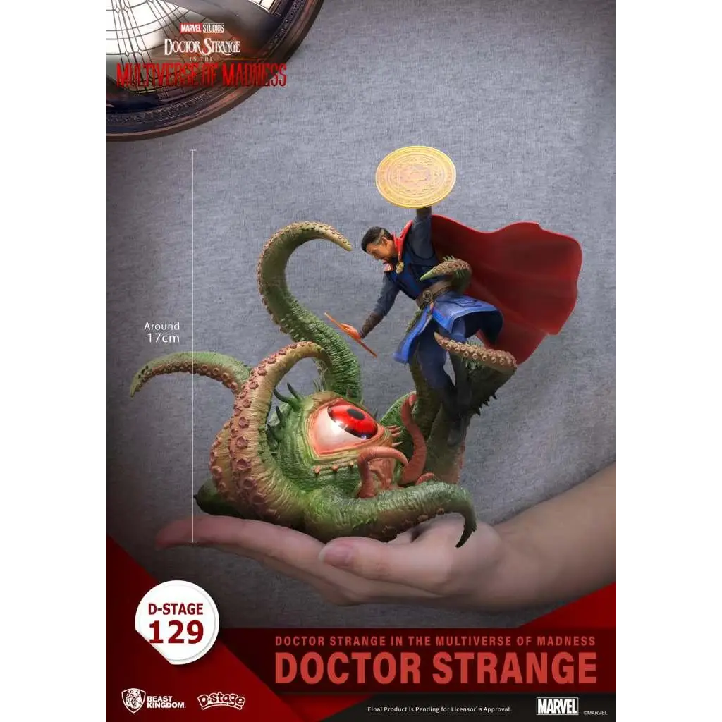 D-Stage Doctor Strange i blå mantel och röd kåpa håller gyllene artefakt över huvudet på grön bläckfiskvarelse med rött öga
