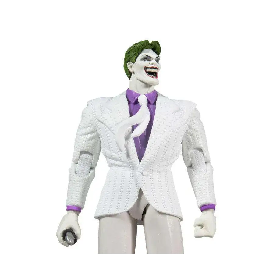 Vit Joker i vit texturerad kostym med lila slips, grönt hår och vita handskar
