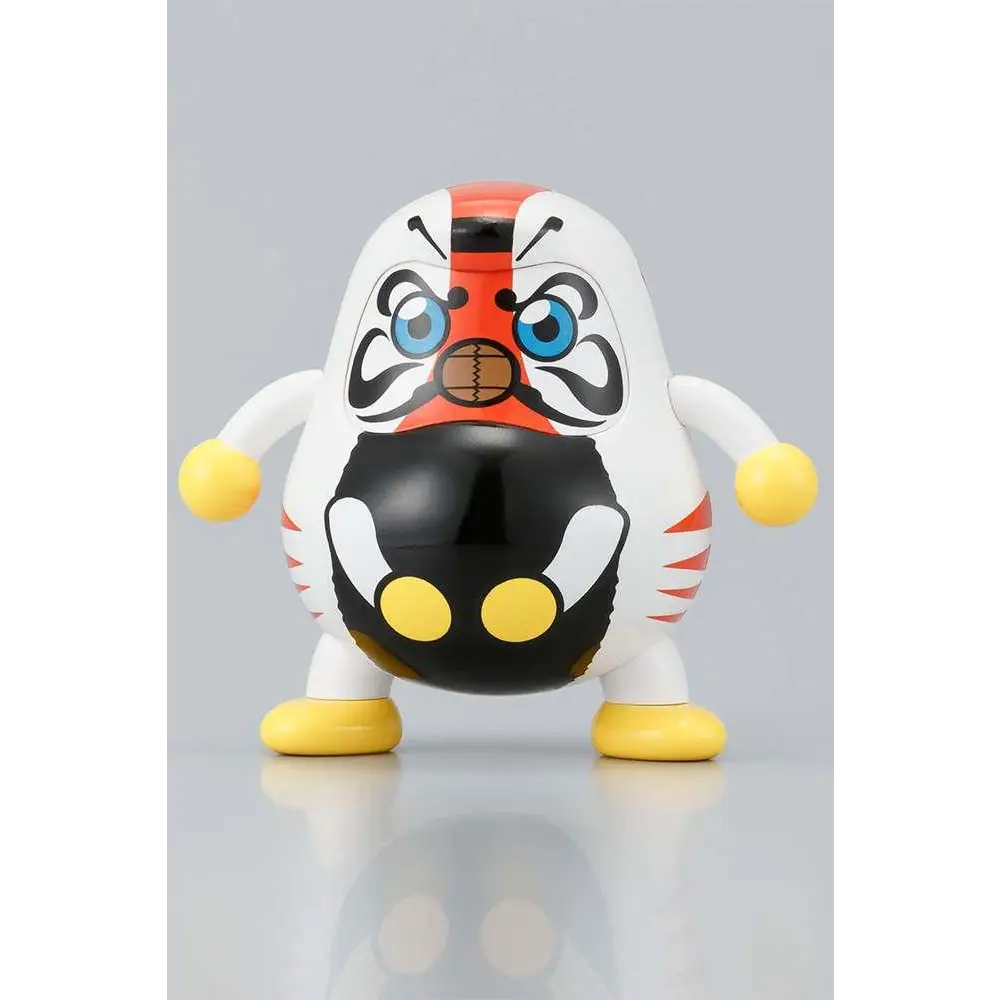 Japansk Daruma-docka: Vit, svart, orange figur med blå ögon och fotbollsformad näsa