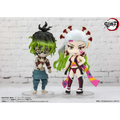 Chibi Demon Slayer figurer av Daki och Gyutaro i display