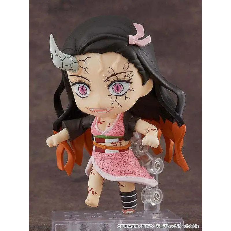 Chibi Tanjiro Kamado-figur från Demon Slayer med svart hår, rosa rosett och grå stenhorna