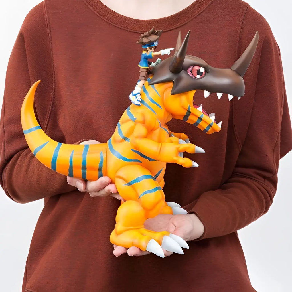 Orange and blue striped Greymon with brown head, white claws and Taichi rider from Digimon PVC statue