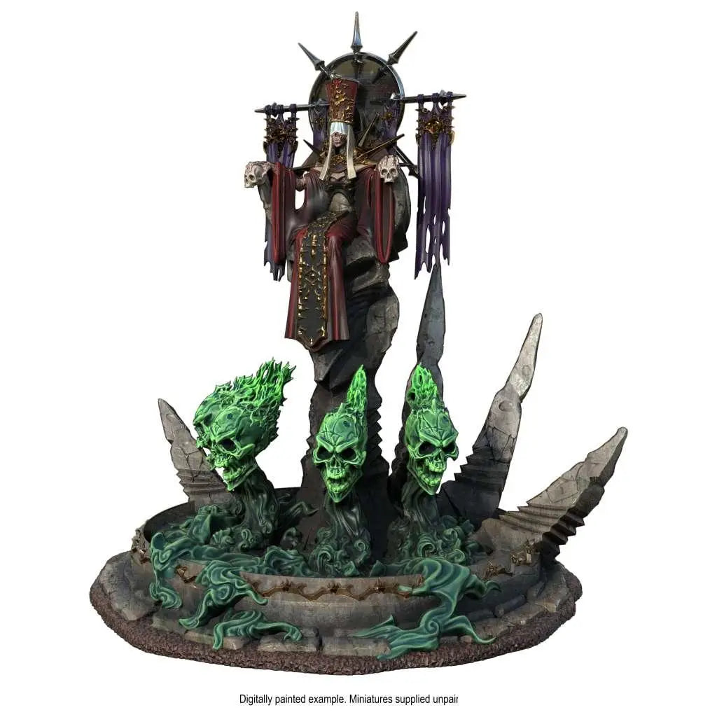 Mörk målad staty av regal figur i röda och guldfärgade kläder på tron i Tower of Lich Empress