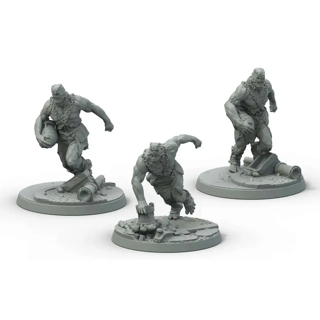 Tre grå plastminiatyrer av muskulösa super mutants med kedjor i dynamiska poser på runda baser från Fallout Wasteland Warfare Suiciders Set
