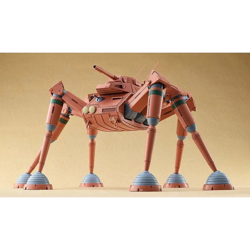 Tanfärgad sexbening mekanisk tankmodell Fang o/t Sun Dougram Desert Gunner MK 1/72 med gröna och blå randiga accenter