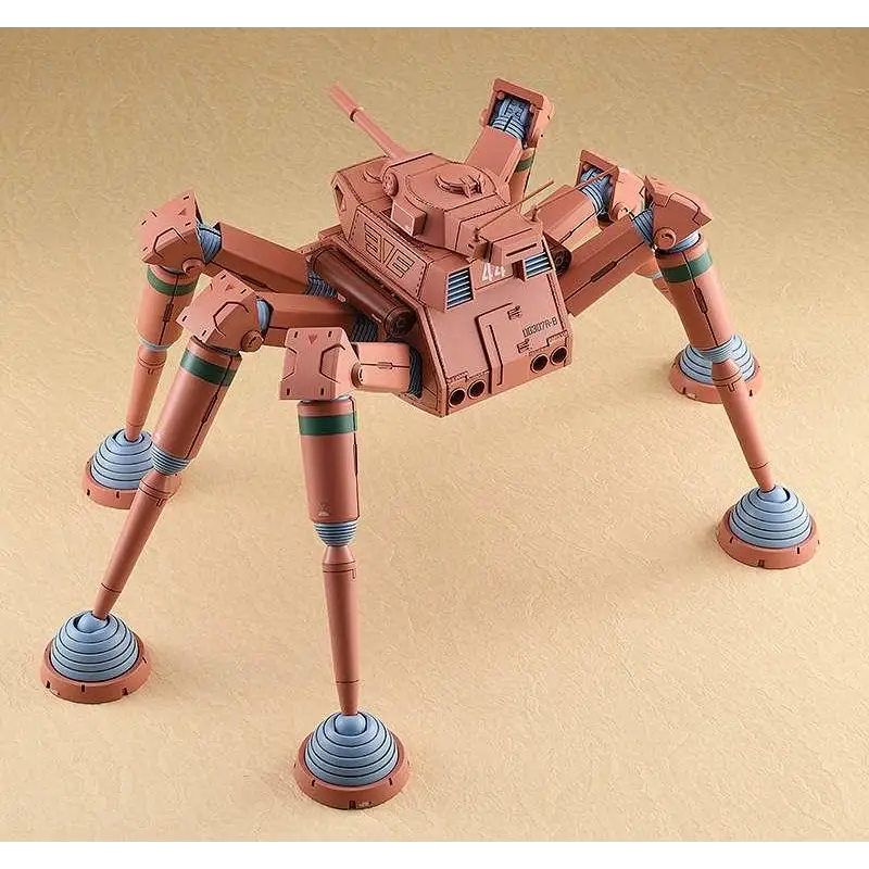 Tanfärgad plastmodell av sexbeningt pansarfordon med blå och gröna accenter i Fang o/t Sun Dougram Desert Gunner MK 1/72