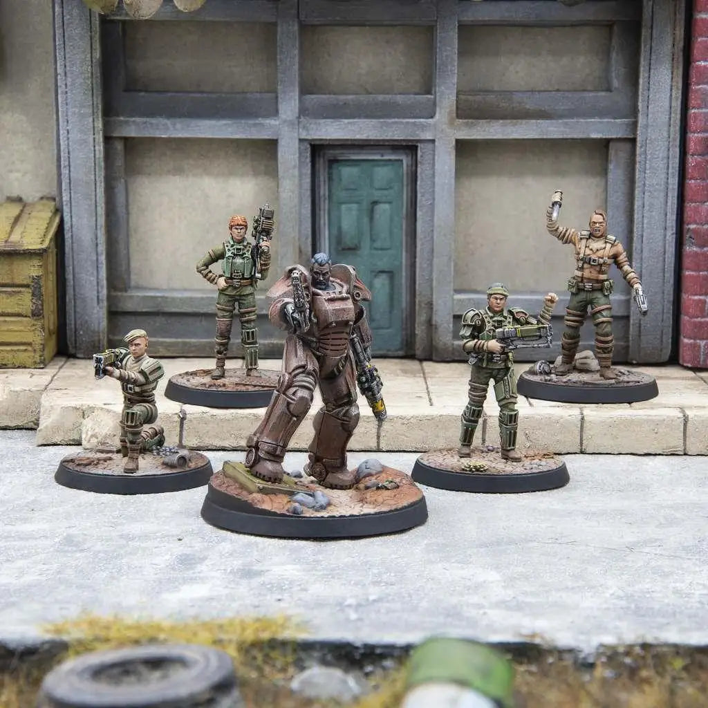 Brun pansrad figur med tungt vapen på cirkulär bas, Fww Gunners Core Box byggsats