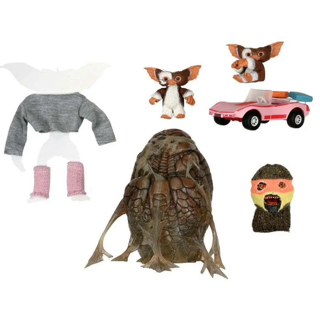 Brun, texturerad gremlinfigur med flera lemmar, skalor och klor från Gremlins 1984-tillbehörspaket