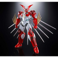 Röd och vit pansrad robotfigur med guldtippade vingar och silverblad från Gx-99 Getter Robot Arc