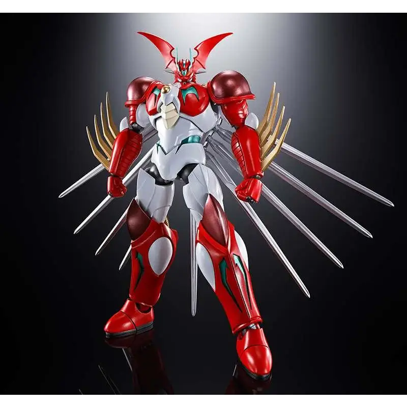Röd och vit pansrad robotfigur med guldtippade vingar och silverblad från Gx-99 Getter Robot Arc