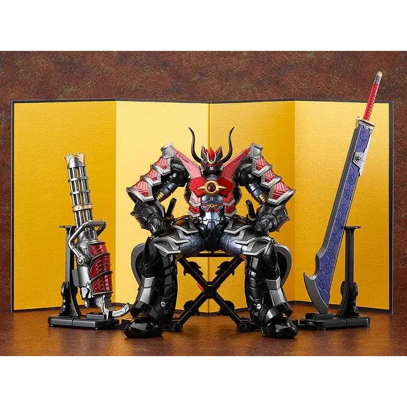 Röd och svart pansrad figur sittande på stol i HAGANE WORKS Mazinkaiser Haou-set