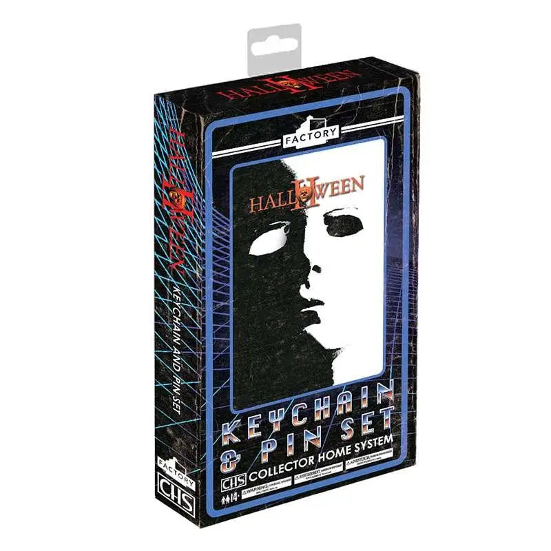 Svartvitt Halloween II nyckelring- och pinset i fabriksmärkt samlarbox