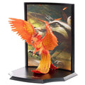 Vibrant Fawkes-fenix i Harry Potter-diorama med basilisk
