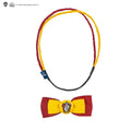 Rött och gult flätat Gryffindor-huvudband med matchande rosett och klämma