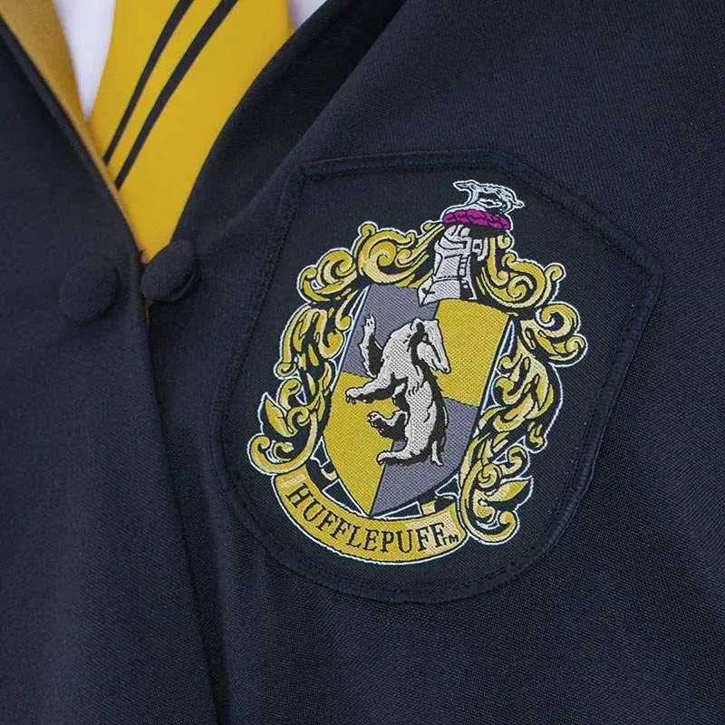 Navyblå Hufflepuff-emblem med broderad gul och grå grävling på Harry Potter-robe