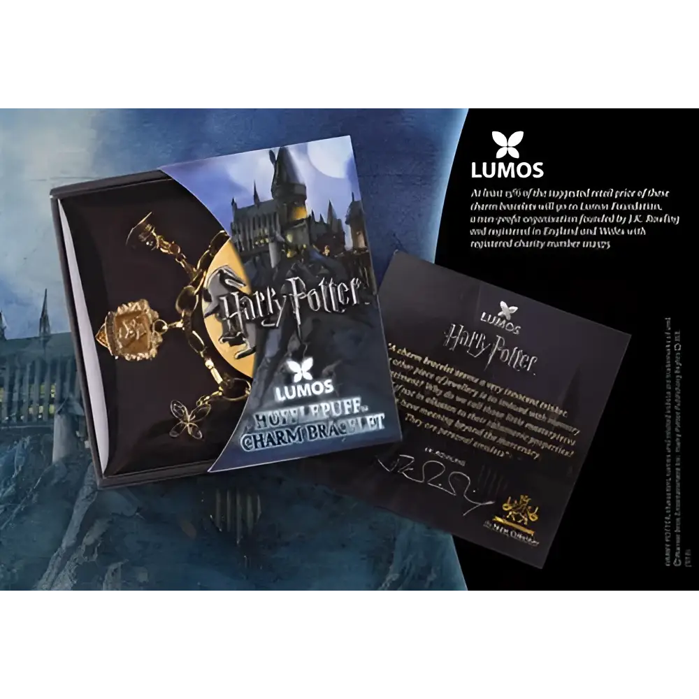 Harry Potter Lumos Hufflepuff-armband med guldfärgade Hogwarts-charms i svart box