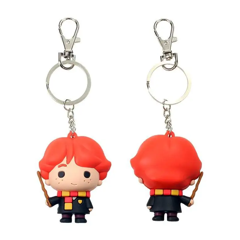 Röd-hårig Ron Weasley-nyckelring med svart mantel och gul-röd scarf, håller trollstav