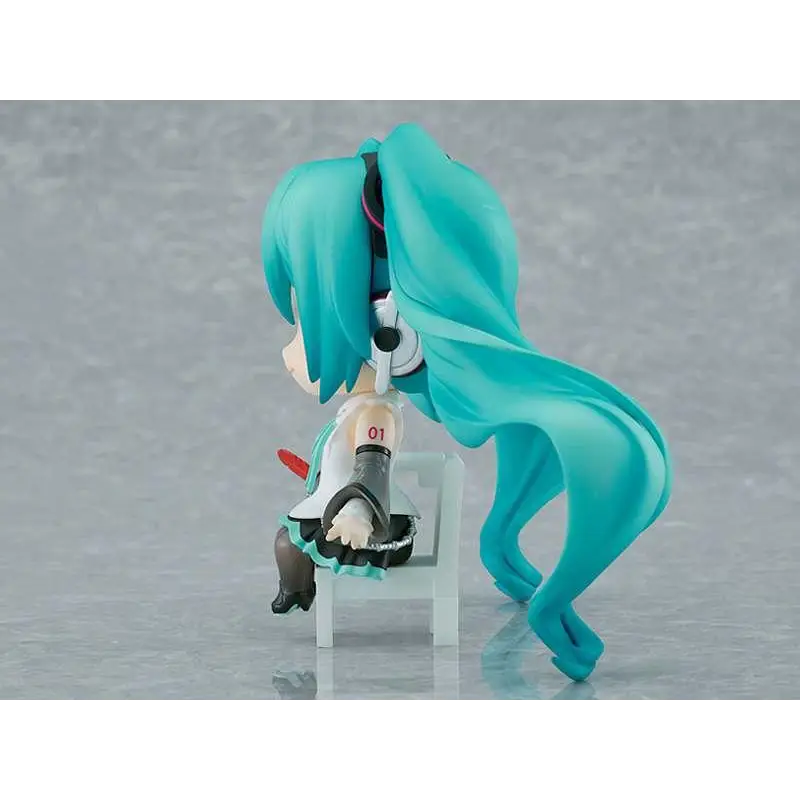 Turquoise-haired Hatsune Miku Akaihane Nendoroid Swacchao figurine in vit outfit med hörlurar