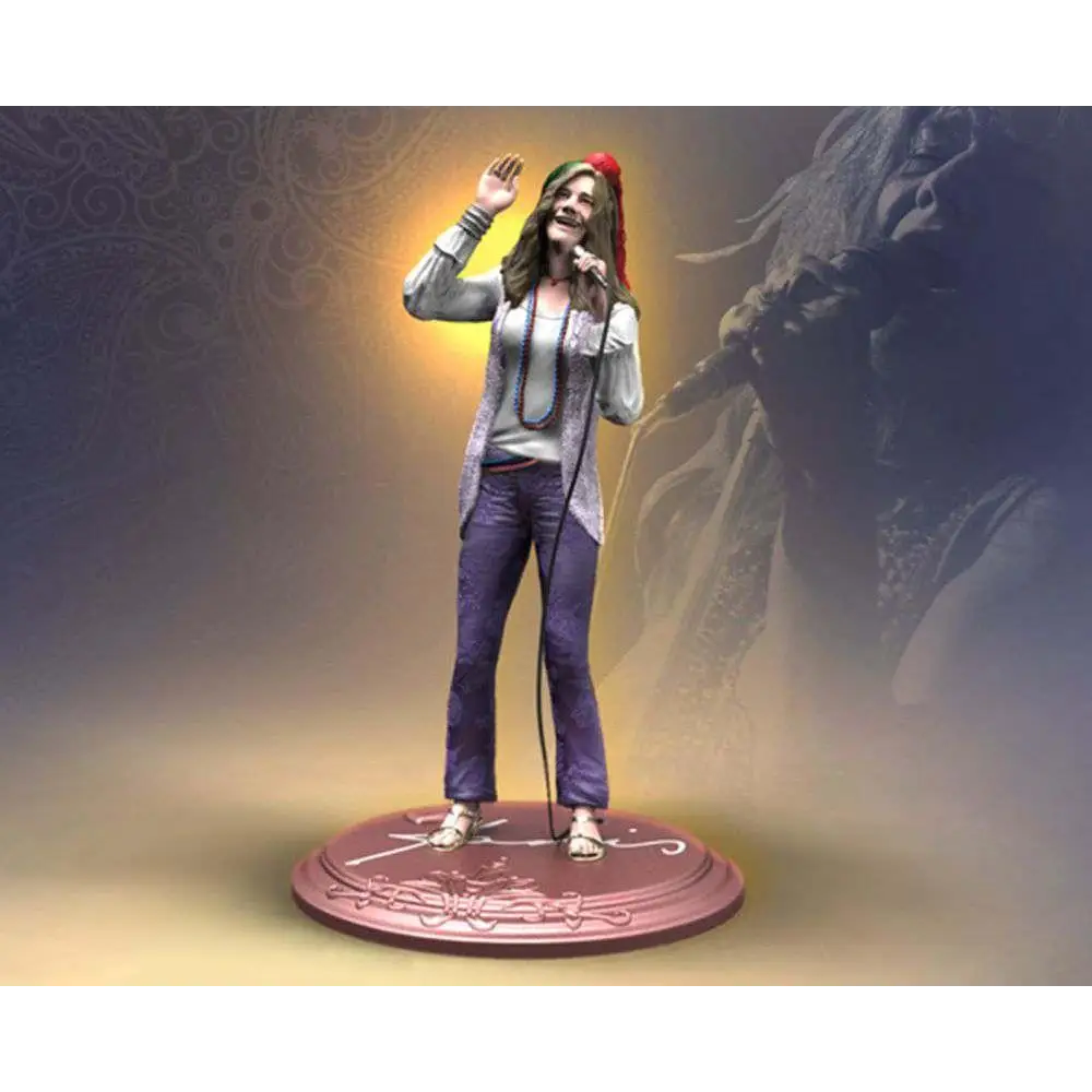 Janis Joplin rockikon-statyn i grå kofta, lila byxor och röd hatt med mikrofon