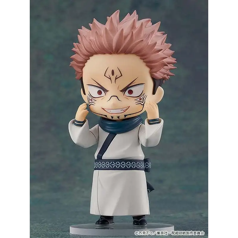 Chibi Jujutsu Kaisen Sukuna Nendoroid-figur med spretig rosa hår, vit mantel med blå detaljer och geometriskt bältesmönster