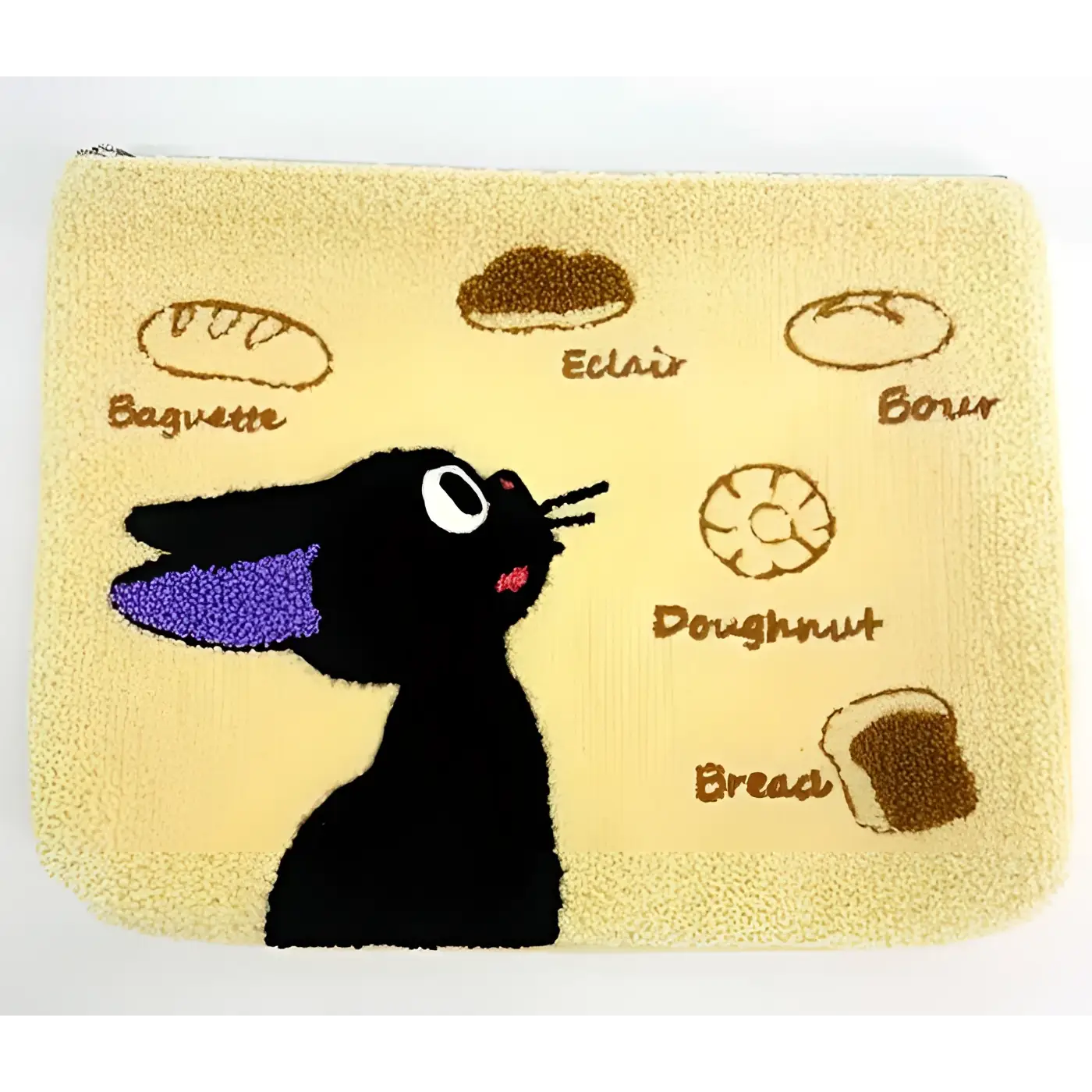 Mjuk beige plyschpung med svart Kiki-katt, lila öron och broderade bröd