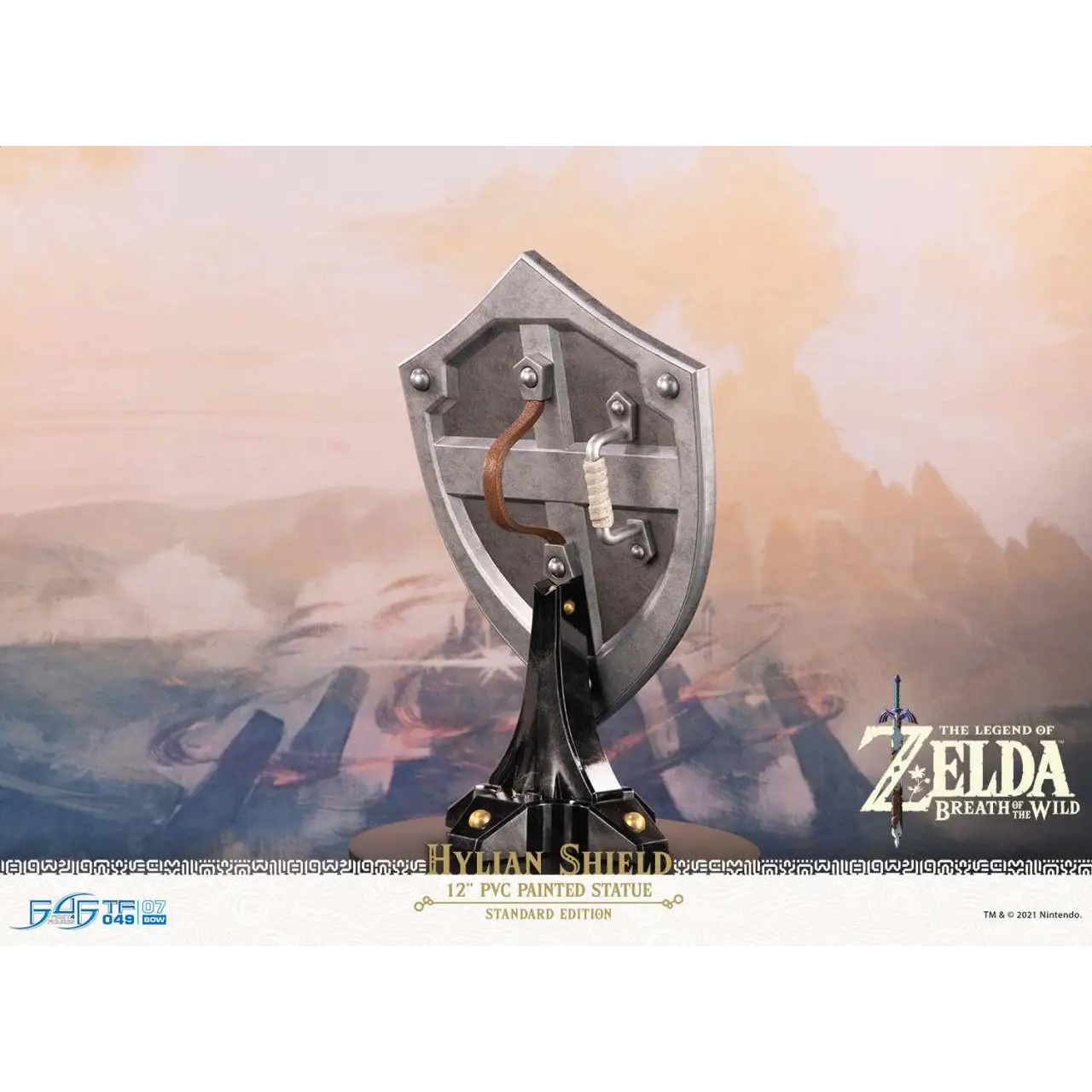 Silverfärgad PVC Hylian Shield-staty med metallfinish, nit och läderrem