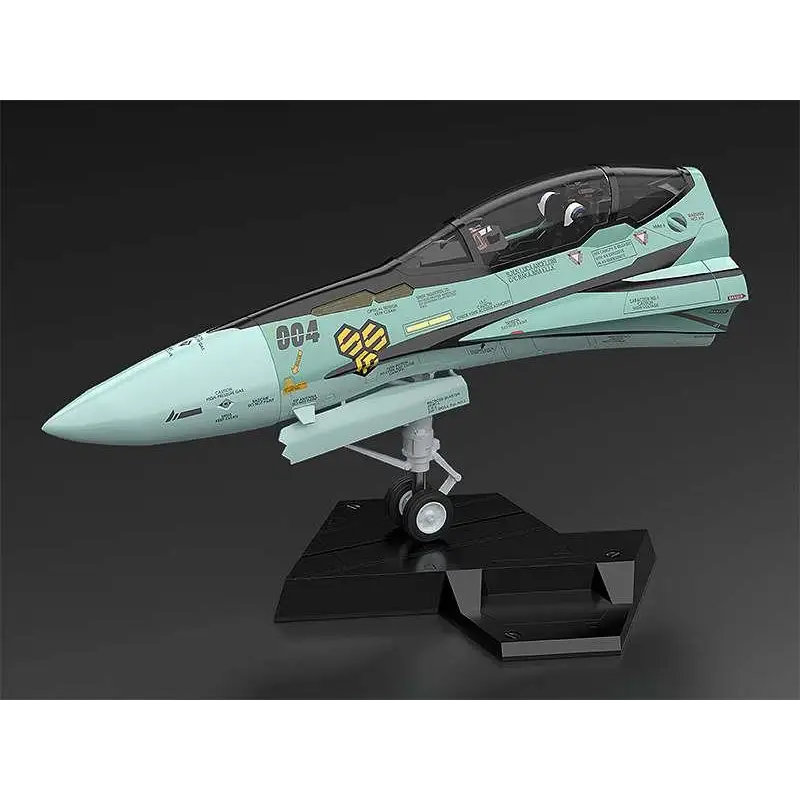 Mintgrön och svart modell av VF-1S Exia från Macross, med gula emblem