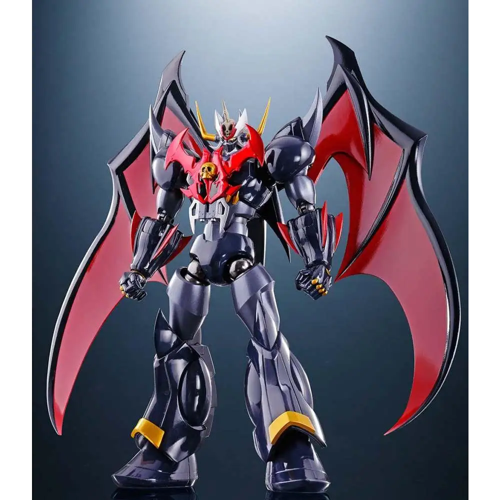 Svart och röd pansrad robotfigur med guldiga accenter, fladdermusvingar och skalleemblem på bröstet, Mazinkaiser SKL Skull Wing Cross Ver. från Tamashii Nations