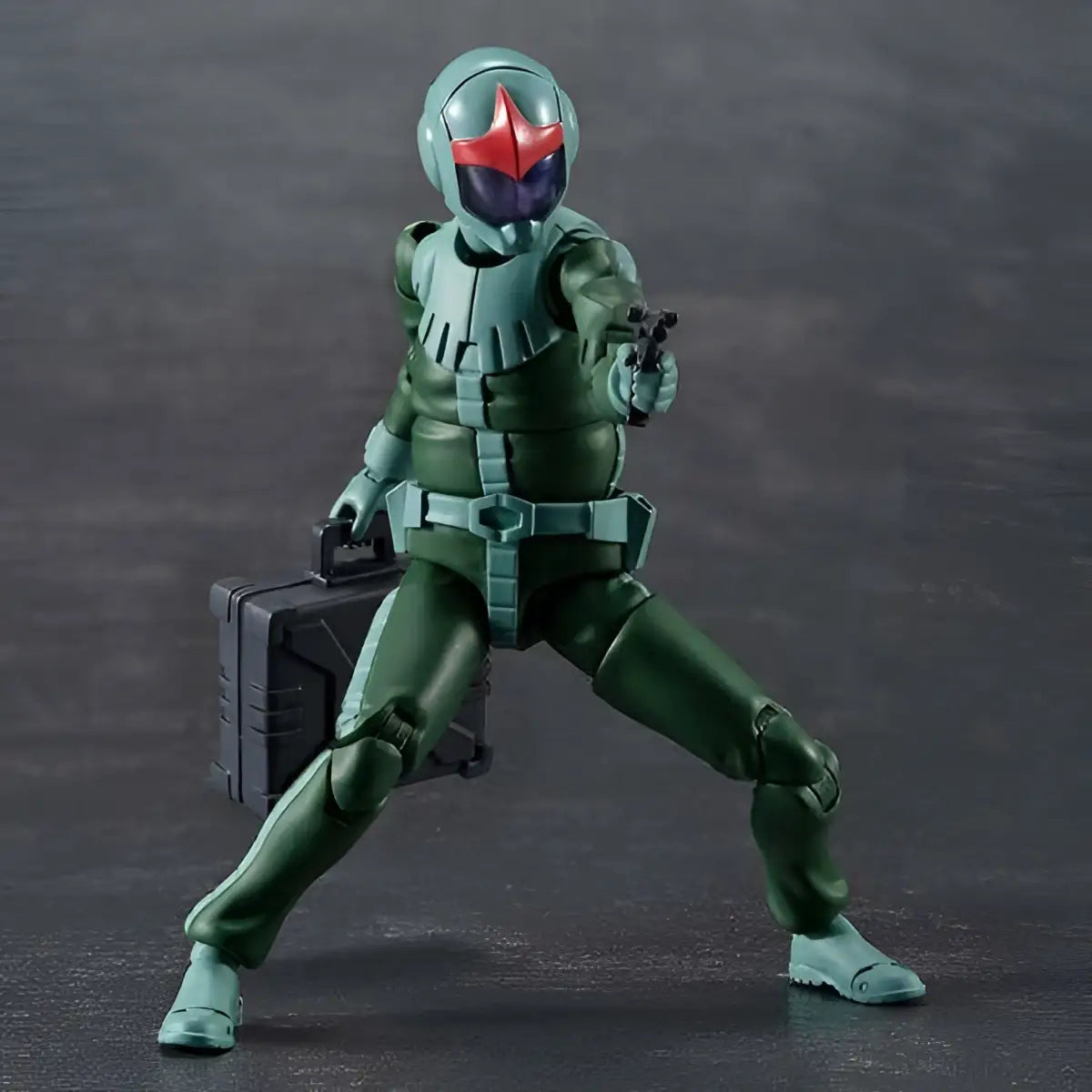 Grön och turkos pansrad Ms. Gundam Zeon-soldat med röd stjärna, pistol och väska