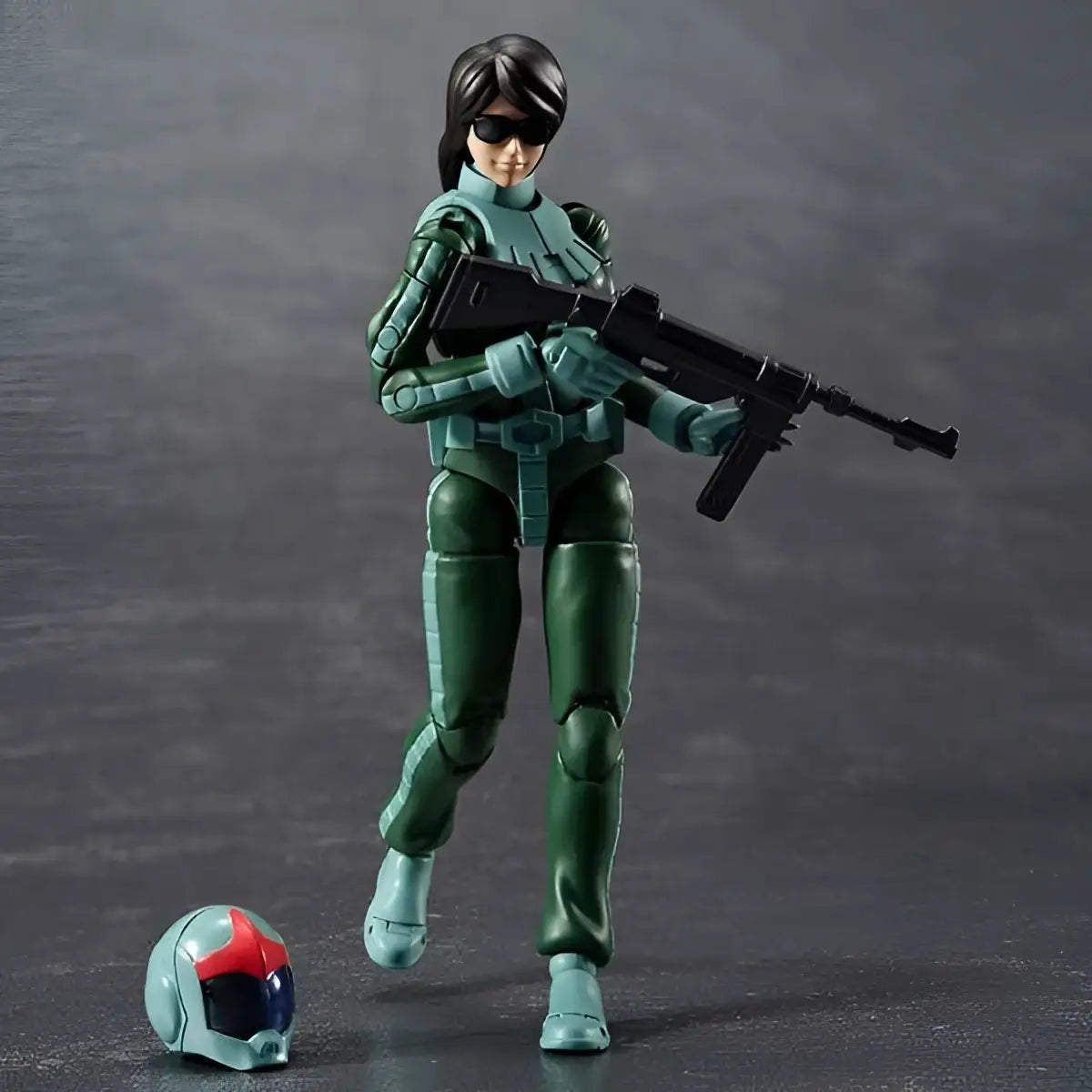 Grön och turkos pansrad Ms Gundam Zeon-armésoldat 05 Norm Suit med svarta solglasögon och gevär