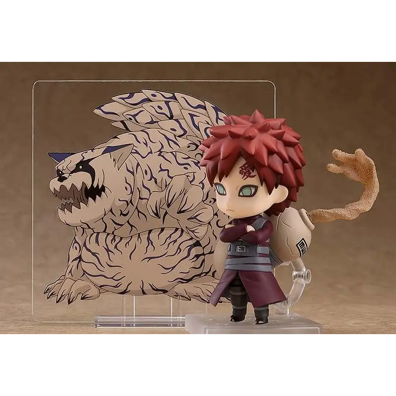 Röd-hårig chibi-figur i rödbrun och grå outfit bredvid beige, tiger-randig varelse med lila markeringar, Naruto Gaara Nendoroid Rerun