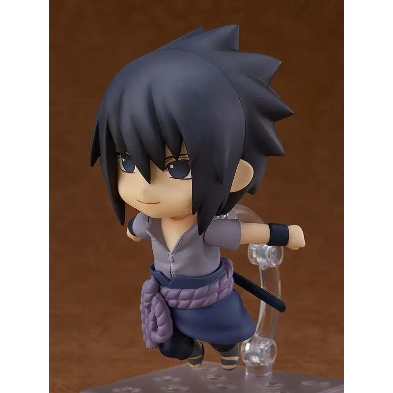 Chibi Sasuke Uchiha Nendoroid-figur med spretigt mörkblått hår, grå tröja och lila bälte