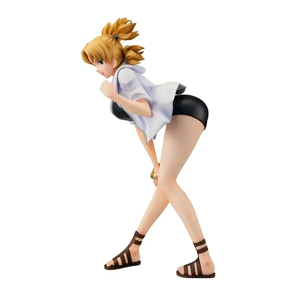 Detaljerad figur av blond animeflicka Temari i twin ponytails, blå skjorta och svarta shorts