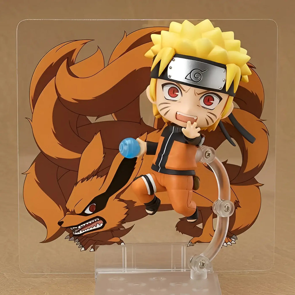 Chibi Naruto Uzumaki Nendoroid 4th Rerun med gul hår, röda ögon och orange dräkt på nio-svansig räv