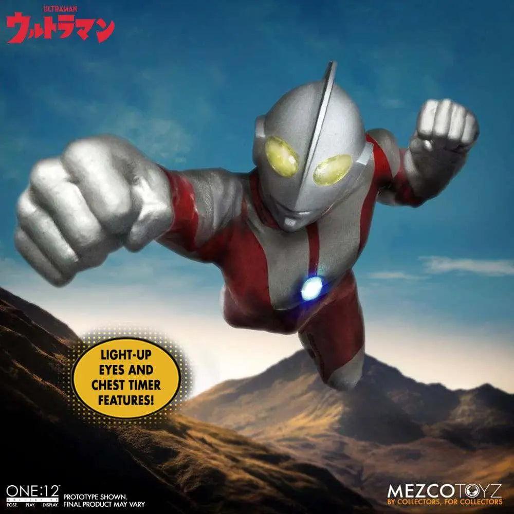 Silver and red Ultraman-actionfigur med lysande gula ögon och blå bröstklocka