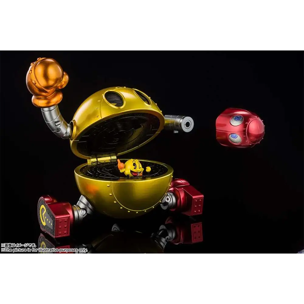 Guldmetallic Pac-Man Chogokin-robot med röda och silverdetaljer och inre gul figur