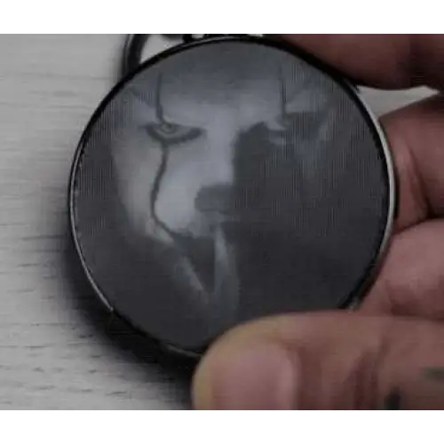 Svart cirkulär Pennywise 2017 lentikulär nyckelring med kedja