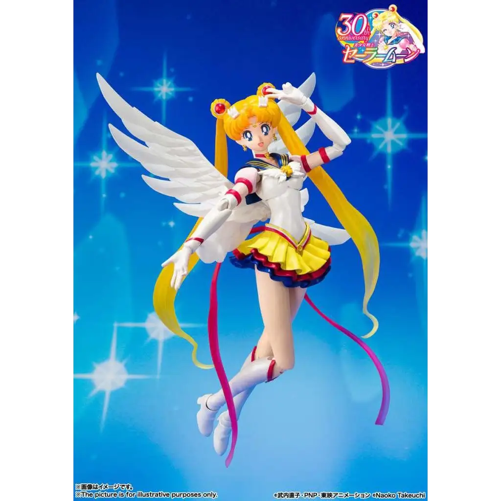 Vit änglalik figur i vitt och gult med långt blont hår, röda tillbehör och detaljerad sjömanstil, Pretty Guardian Sailor Moon Eternal SH Figuarts