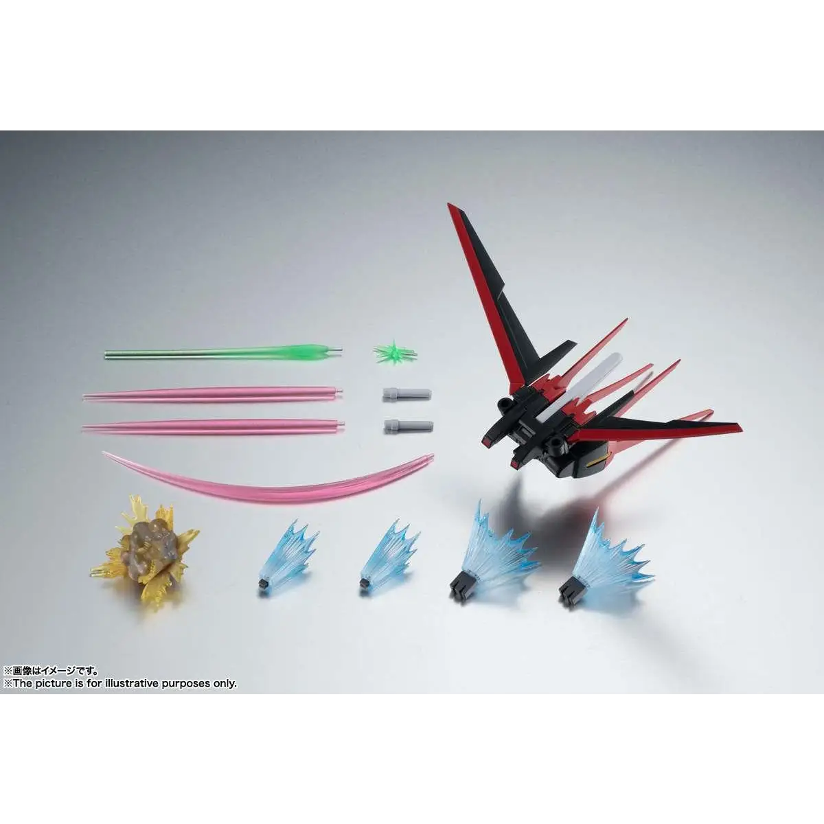 Röd och svart plast Gundam-modell med vinklade vingar och detaljerad rustning