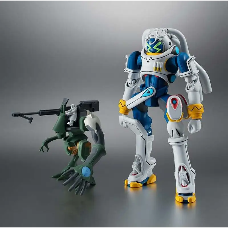 Vit och blå Rs Gainer & Gachico Overman King Gainer actionfigur med gula accenter och gröna lysande ögon